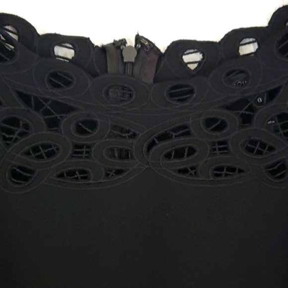White Hause Black Market~Woman Size 0~Black Fit/Flare Lazer Cut Dress Pockets. - Picture 4 of 11